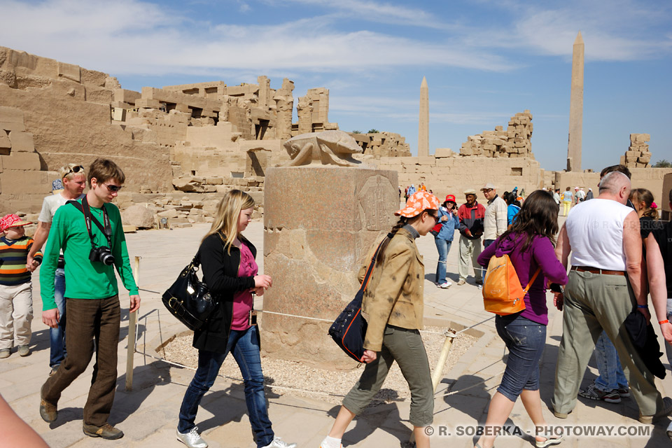 Tourists walking around the sacred scarab