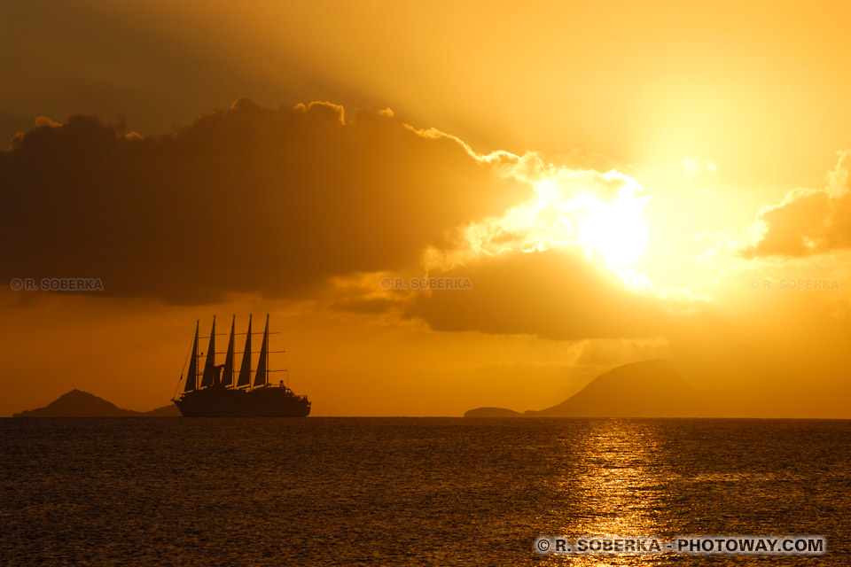 Sunset over a Sailing Ship and the Sea