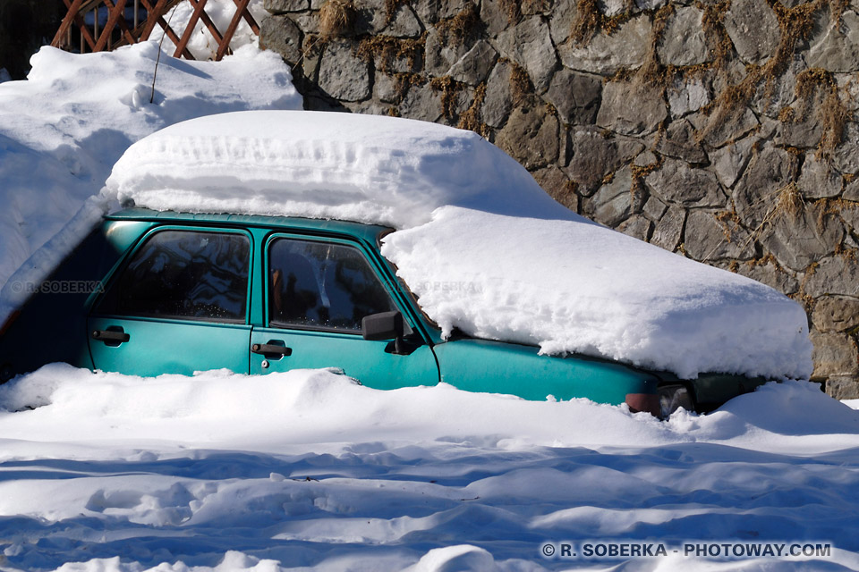 Snow on car Photos - Carpathian Mountains, Romania