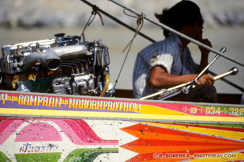 Isuzu car engine mounted on a long tail boat in Thailand